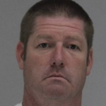 Mug shot from: Dallas County Sheriff’s Office